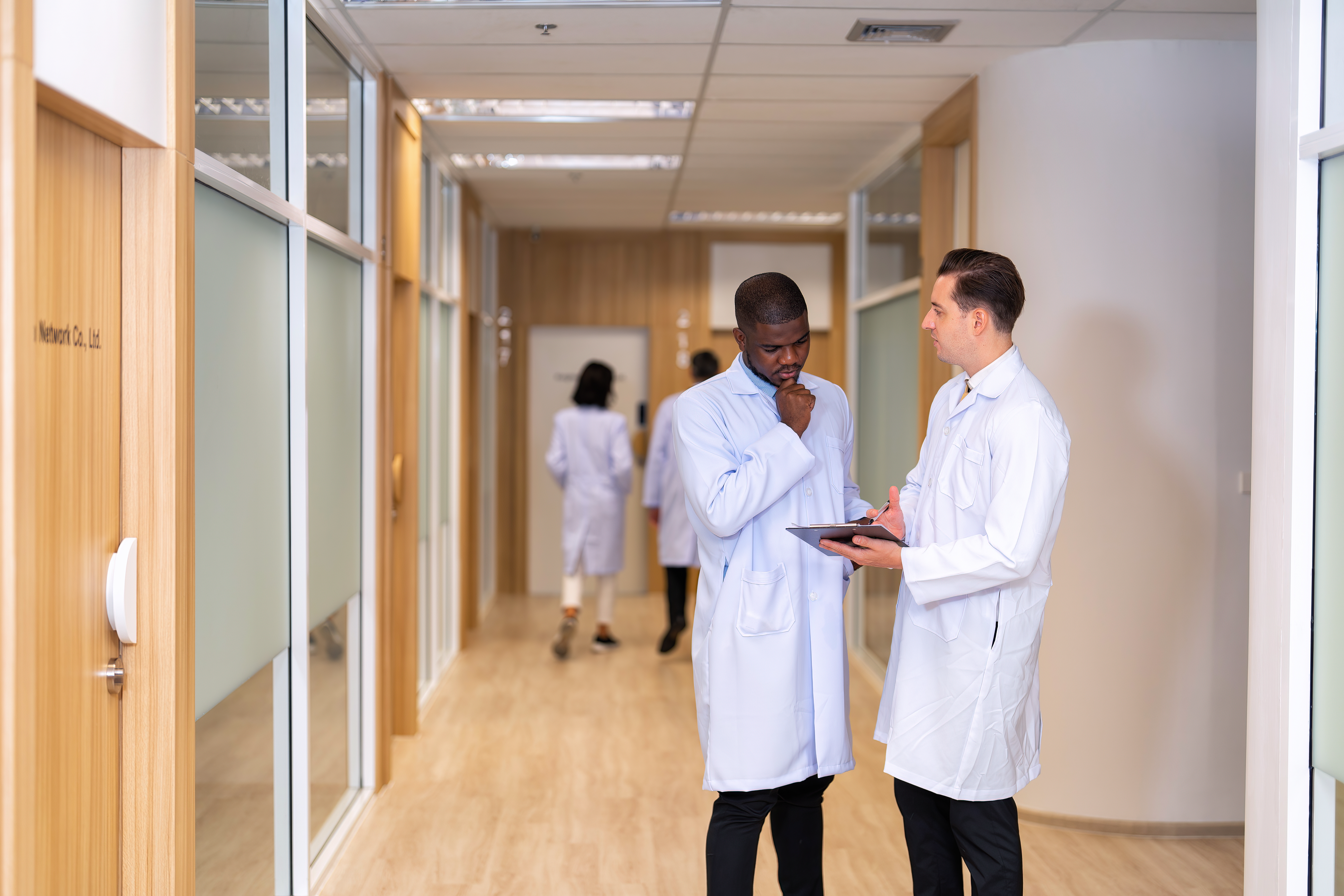 male doctors in a hospital hallway
